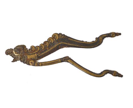 Antique Indian betel nut cracker, ornately worked in mixed metals, of figural form, 25cm long
