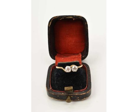 Antique diamond two stone cross over ring with two old cut diamonds estimated to weigh approximately 0.60cts in total, in a c