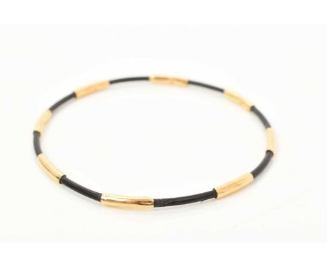 Gold mounted elephant hair bangle, together with a five-strand elephant hair bangle with gilt metal mounts and a similar ring