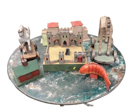 Vintage toys including school built model of a roman fort from Hadrian’s Wall. Homemade toy wooden and painted house. Toy woo