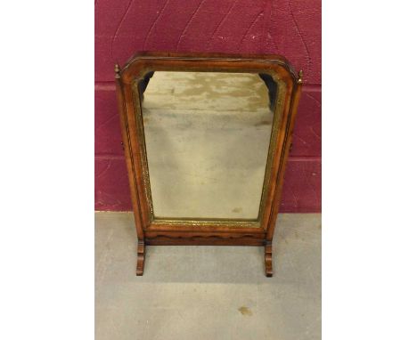 George II walnut swing frame dressing table mirror, the plate in gilt slip with re-entrant angles and cushion frame, 62cm hig