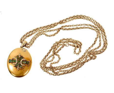 Victorian gold emerald and seed pearl oval locket, 60mm x 37mm, on a Victorian 9ct gold guard chain, approximately 147cm long