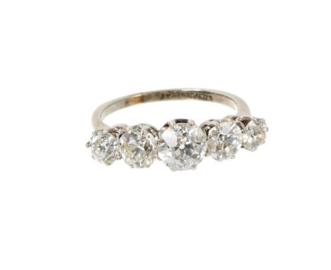 Antique diamond five stone ring with five graduated old cut diamonds estimated to weigh approximately 2cts in total, in plati