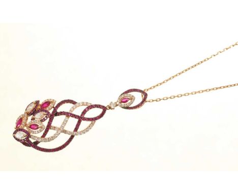 18ct gold ruby and diamond pendant necklace, the stylised pendant set with marquise cut and brilliant cut rubies and diamonds