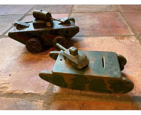Homemade wooden money box in the form of an army tank, camouflage painted and inscribed ‘Save for Elizabeth Ann’, further ins