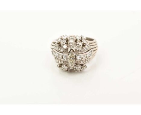 Diamond cluster cocktail ring, the bombé diamond cluster with central marquise cut diamond, square cut and brilliant cut diam