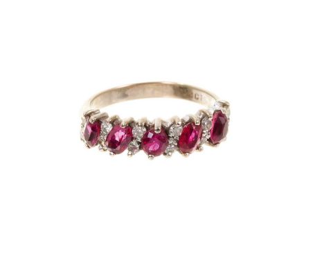 Ruby and diamond ring with a half hoop of marquise cut rubies and brilliant cut diamonds in 18ct white gold setting. Ring siz