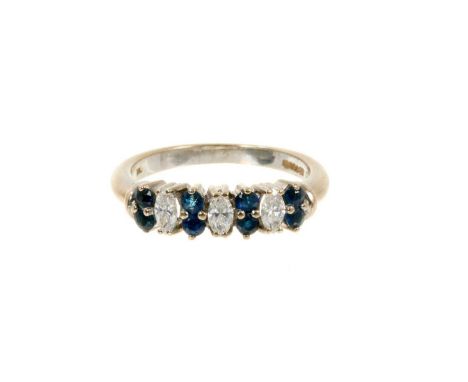 Sapphire and diamond half eternity ring with three marquise cut diamonds interspaced by pairs of round mixed cut blue sapphir