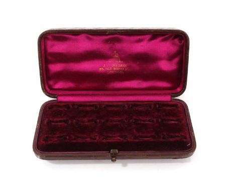 Late Victorian brown leather ring box retailed by J.W. Benson, London.Provenance: The collection of the late Ismay Diana Fitz