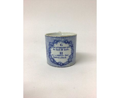 Unusual child’s earthenware mug, printed in blue with G and H, figures and a verse, circa 1850, 6.5cm highSome natural crazin