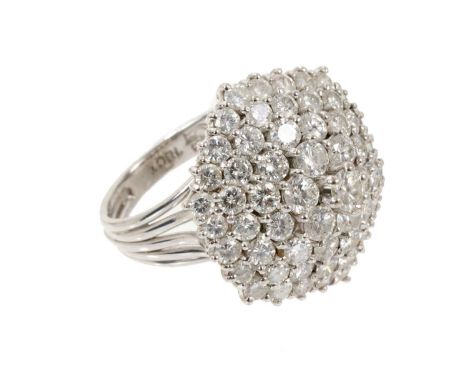 Diamond cluster ring with a hexagonal tiered cluster of brilliant cut diamonds estimated to weigh to weigh approximately 3.8c