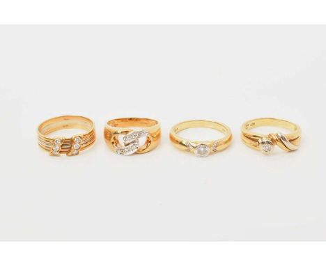 Four 18ct gold and diamond set rings to include a single stone ring with a 0.25ct diamond, sizes L-N.Total gross weight appro