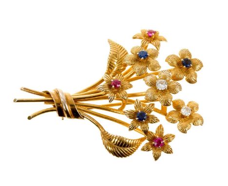 18ct gold diamond ruby and sapphire floral spray brooch, the eight flower heads set with two brillaint cut diamonds, three ro
