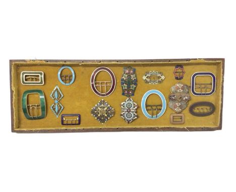 Collection of antique and vintage enamel buckles, the largest 9cm high, 16 in total, presented in fitted tray