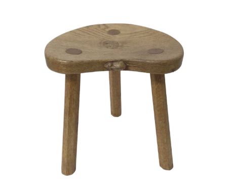 Robert 'Mouseman' Thompson oak stool, with signature mouse to the saddle seat on three splayed facetted legs, 30cm wide x 36c