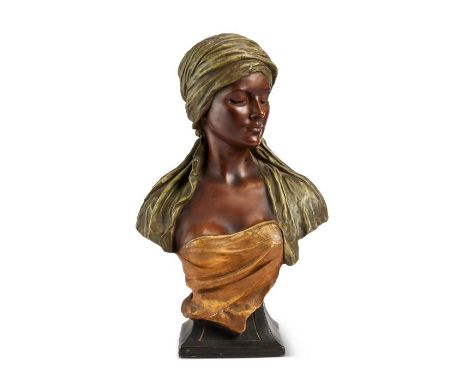 Rudolf Thiele (1856-1930) for GoldscheiderA polychrome painted terracotta bust of a young Arab women, Looking right and with 