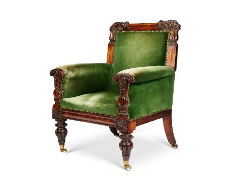 A George IV carved rosewood library armchair the design by John TaylorUpholstered and close-nailed in green velvet the lotus 