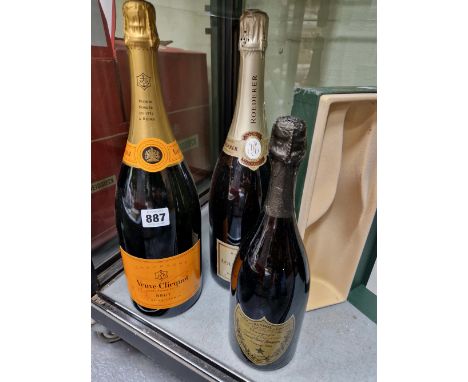 CHAMPAGNE: A BOXED BOTTLE OF 1988 DOM PERIGNON TOGETHER WITH MAGNUMS OF NON VINTAGE VEUVE CLIQUOT AND LOUIS ROEDERER