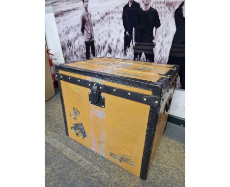 A LOUIS VUITTON BRASS STUDDED LEATHER COVERED CABIN TRUNK. WITH RELINED INTERIOR