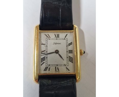 A VINTAGE SWISS DeLANEAU WRISTWATCH. THE CASE STAMPED 18k AND .750 AND ASSESSED AS 18ct GOLD. ON A LEATHER STRAP WITH GOLD PL