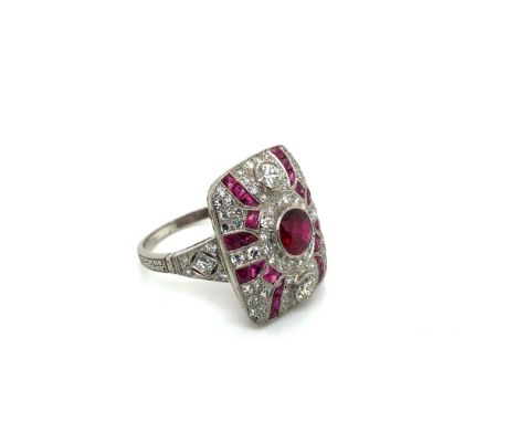 AN ART DECO STYLE RUBY AND DIAMOND PANEL RING. UNHALLMAKRED, ASSESSED AS PLATINUM. ESTIMATED APPROX STATED DIAMOND WEIGHT 0.6