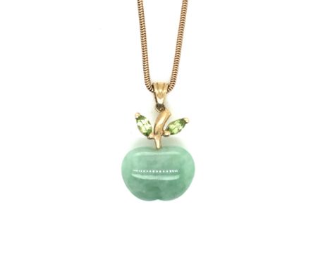 A 9ct HALLMARKED GOLD JADE AND GEMSET APPLE PENDANT SUSPENDED ON A 9ct GOLD SNAKE CHAIN. PENDANT DROP 3cms, CHAIN LENGTH 46.5