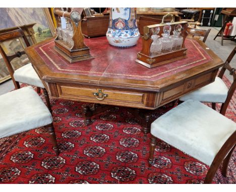 AN IMPRESSIVE 19TH CENTURY&nbsp; ARTS AND CRAFTS MAHOGANY OCTAGONAL&nbsp; LIBRARY CENTRE TABLE, THE RED LEATHER INSET TOP OVE