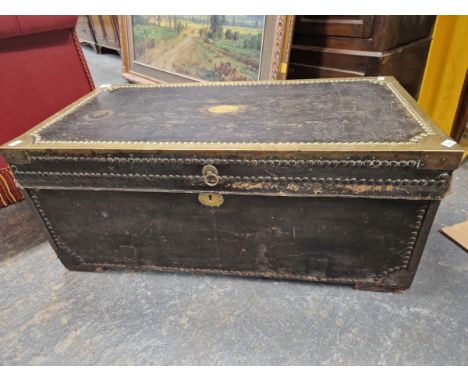 A 19th C. BRASS CLOSE NAILED LEATHER MOUNTED CAMPHOR WOOD TRUNK. W 93.5 x D 47 x H 41cms.