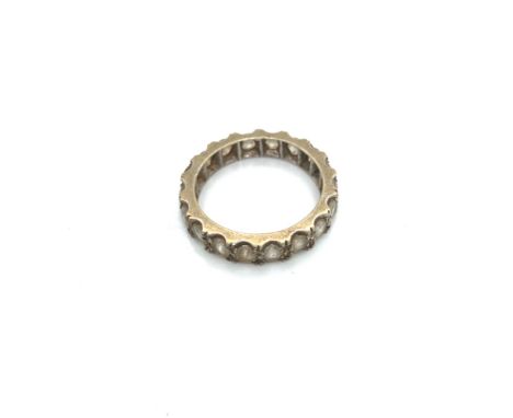 A VINTAGE STONE SET FULL ETERNITY RING. FINGER SIZE N CENTRE. WEIGHT 3.54grms. 