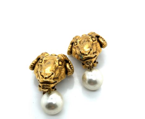 A PAIR OF GOLD PLATED GRAECO ROMAN RAM'S HEAD AND FAUX PEARL CLIP ON DROP EARRINGS. SIGNED 1991, MMA KHM, FOR THE METROPOLITA