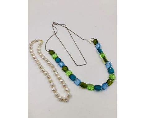 A CELINE MULTI FACET BEADED NECKLACE COMPLETE WITH SIGNATURE CHARM WITH SILVER ADJUSTABLE CHAIN. LENGTH 116cms TOGETHER WITH 