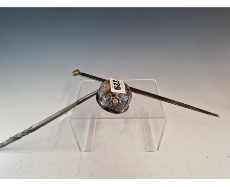 A SILVER MEAT SKEWER BY WALTER WILSON, LONDON 1930, WITH A CYLINDRICAL SCROLL HANDLE. 77.3Gms. TOGETHER WITH A HORN HANDLED T