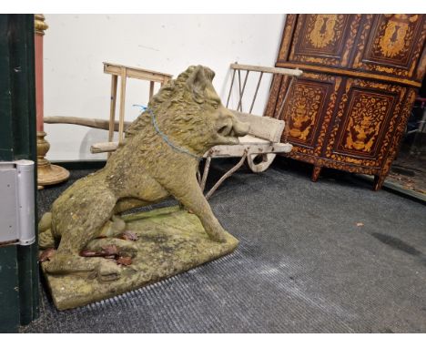 A PAIR OF VINTAGE WEATHERED RECONSTITUTED STONE FIGURES OF SEATED BOAR ON PLINTH BASES. 79CM HIGH