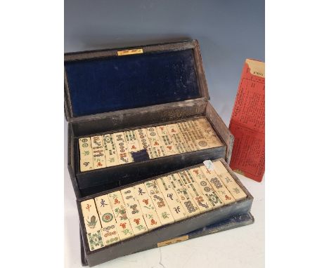 A YAMANAKA BLUE LEATHER CASED BONE AND BAMBOO MAHJONG SET, THE CASE.   W 29.5cms.