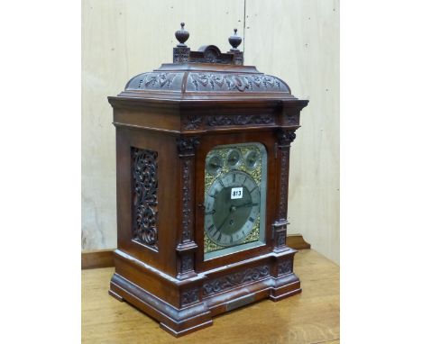 WEST &amp; SON, DUBLIN, A CARVED MAHOGANY BRACKET CLOCK WITH BRACKET, THE MOVEMENT CHIMING ON EIGHT BELLS OR FOUR COILED RODS