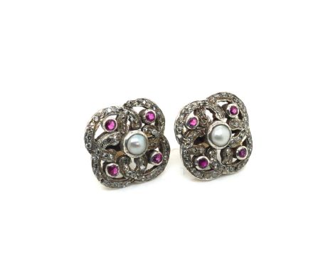 A PAIR OF VINTAGE ANGLO-INDIAN DIAMOND, RUBY AND PEARL STUD EARRINGS. UNHALLMARKED, ASSESSED AS 9ct GOLD AND SILVER OVERLAY. 