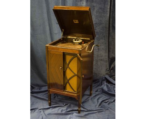 Cabinet gramophone: an HMV Model 157, with  5a soundbox and internal divided horn with grille and doors, in repolished mahoga