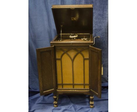 Cabinet gramophone: an HMV Model 163, with 5a soundbox and re-entrant horn enclosed by grille and doors – 40 in high (water m