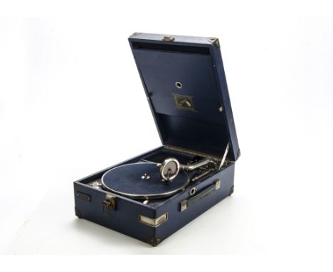 Portable gramophone: an HMV Model LB101J, wit No. 4 soundbox and blue case with trade label on front of E.B. Philips, Londond