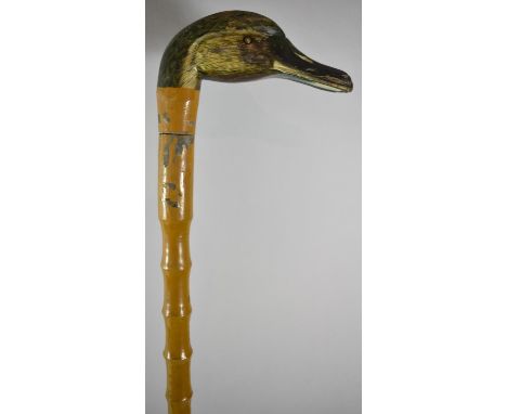 A Novelty Carved Wooden and Painted Walking Stick with Goose Head Handle, 90cm long 