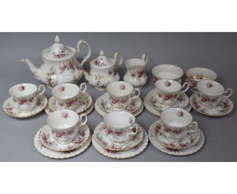 A Royal Albert Lavender Rose Teaset to comprise Large Teapot, Bachelors Teapot, Jug, Two Sugar Bowls, Eight Cups, Eight Sauce