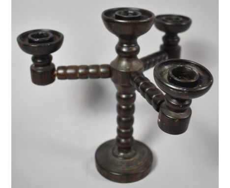 A Late Victorian/Edwardian Wooden Three Branch Candelabra with Bobbin Support and Struts, 18cm high 