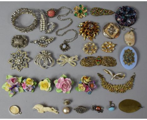 A Vintage Tin Containing Various Costume Jewellery, Brooches etc Czech Buckles, Ceramics Floral Examples. Fur Clips, Bone Car