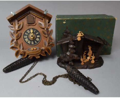 A Mid 20th Century Cuckoo Clock (Hands with Loss) and Boxed Black Forest Crib, "Stille Nacht Heilige Nacht" 