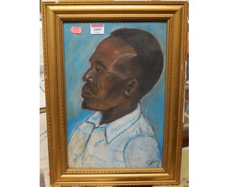 20th century school profile portrait of a North African man, pastel, indistinctly signed, 37x24cm