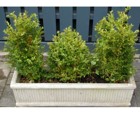 A contemporary reconstituted stone long box planter, with fluted decoration, length 91.5cm