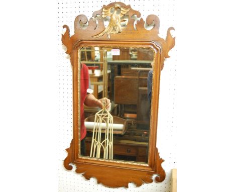 A Chippendale style mahogany fret carved wall mirror, 78 x 46cm