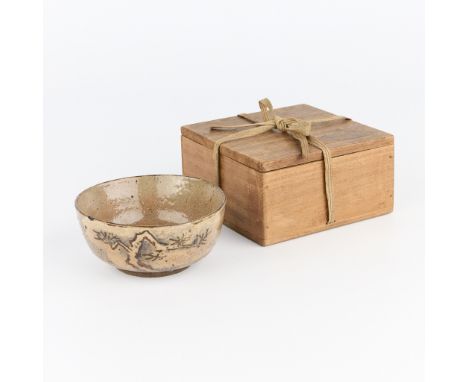 Karatsu chawan or tea bowl decorated along the side with pine boughs against white clouds. Inspired by designs from Kyoto pot