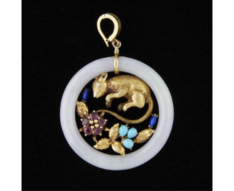 14k yellow gold and jade pendant comprised of a circle of white jade with hinged bale. In the center of the jade circle is a 