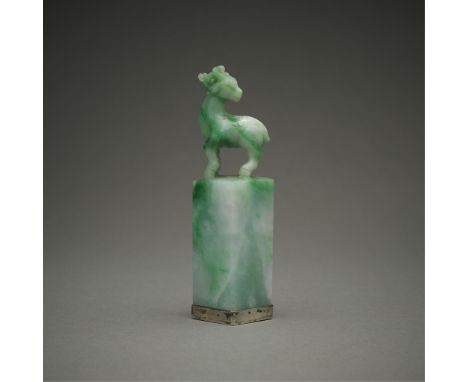 20th century Chinese carved jadeite seal surmounted by a carving of a deer. With a sterling silver seal base with a three-let